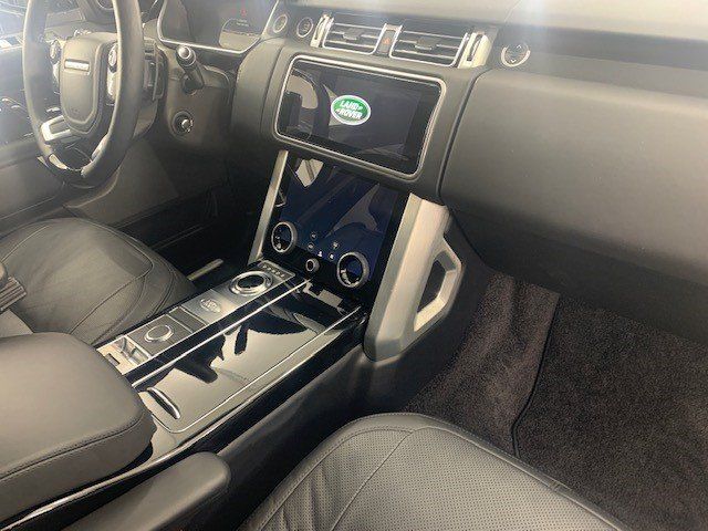 The interior of a land rover range rover is shown.