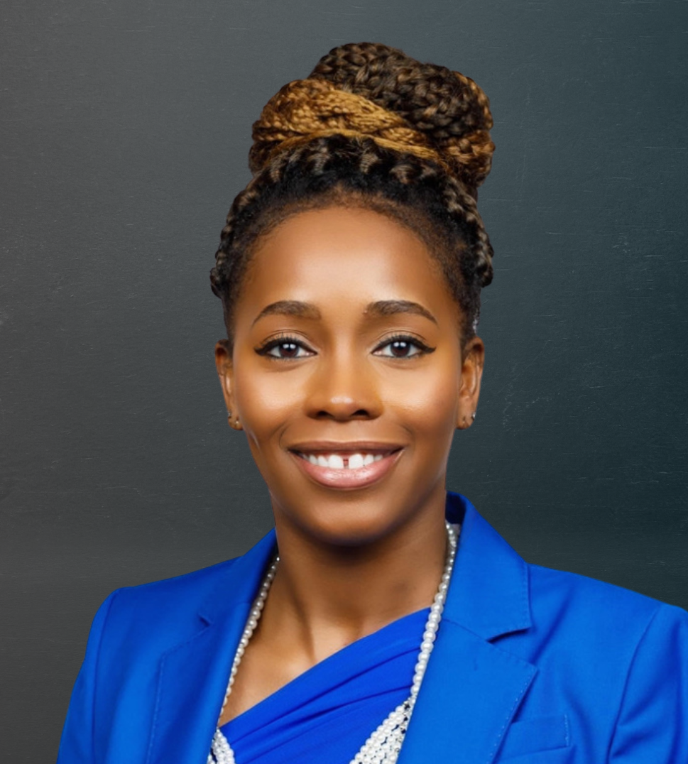 Portrait of a smiling person in a blue blazer against a dark background