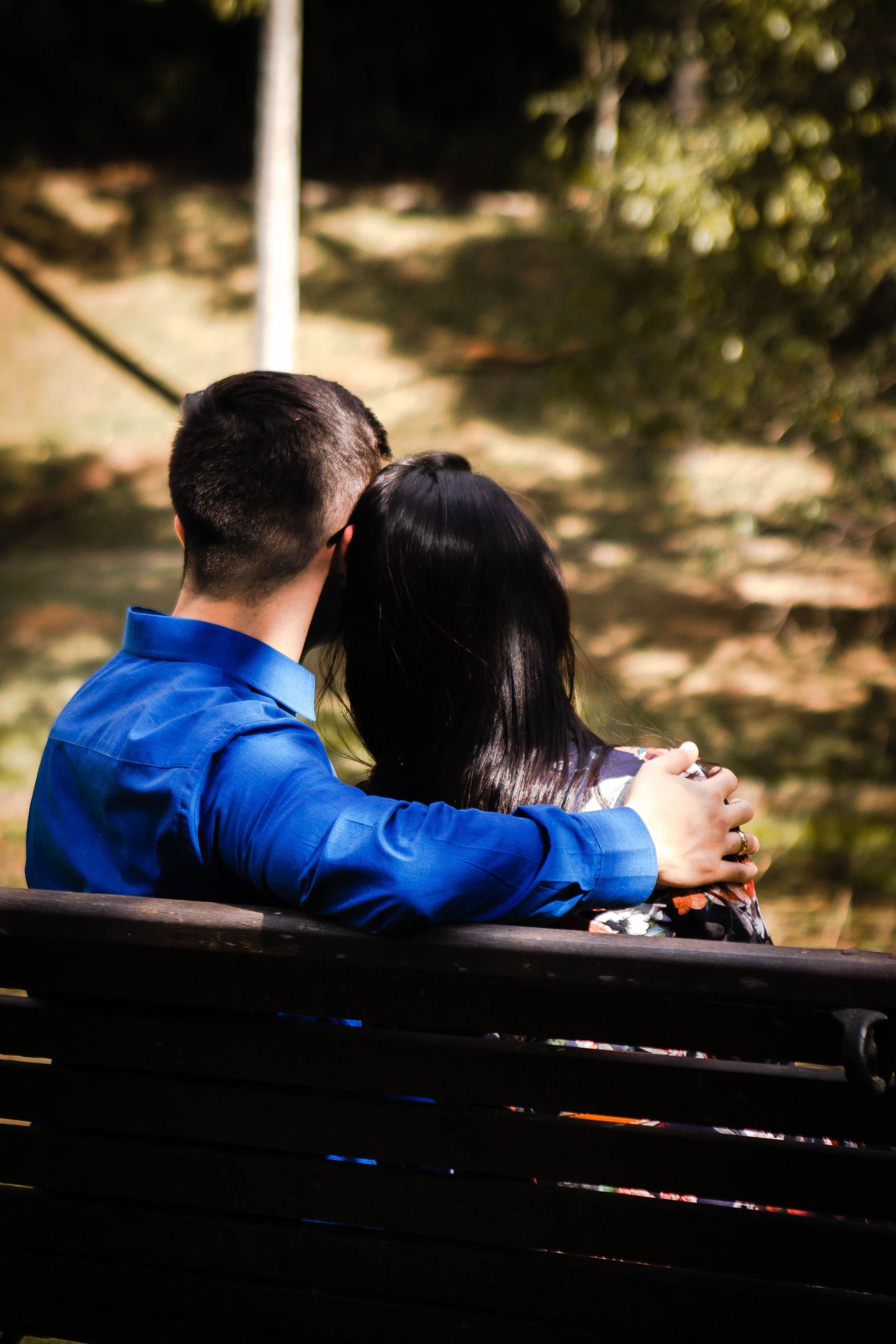 Two people in a quiet, heartfelt conversation
