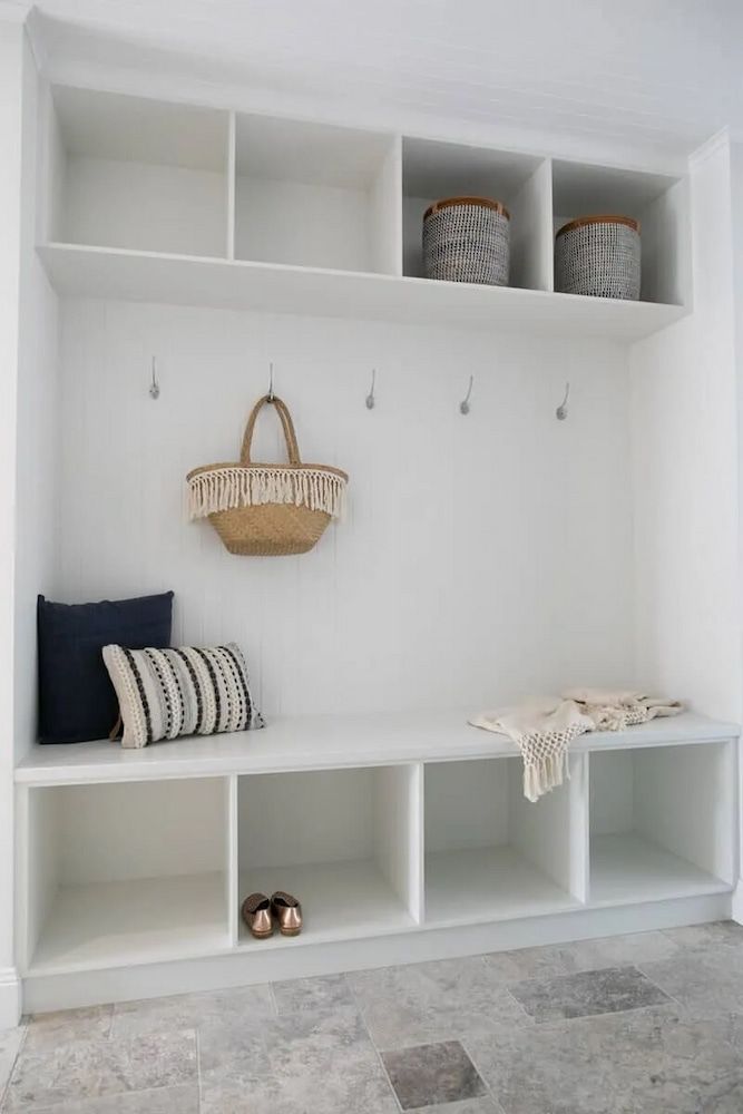 There is a Bench in the Middle of the Room With a Basket Hanging From the Ceiling — Custom Cabinets Design in Berrimah, NT