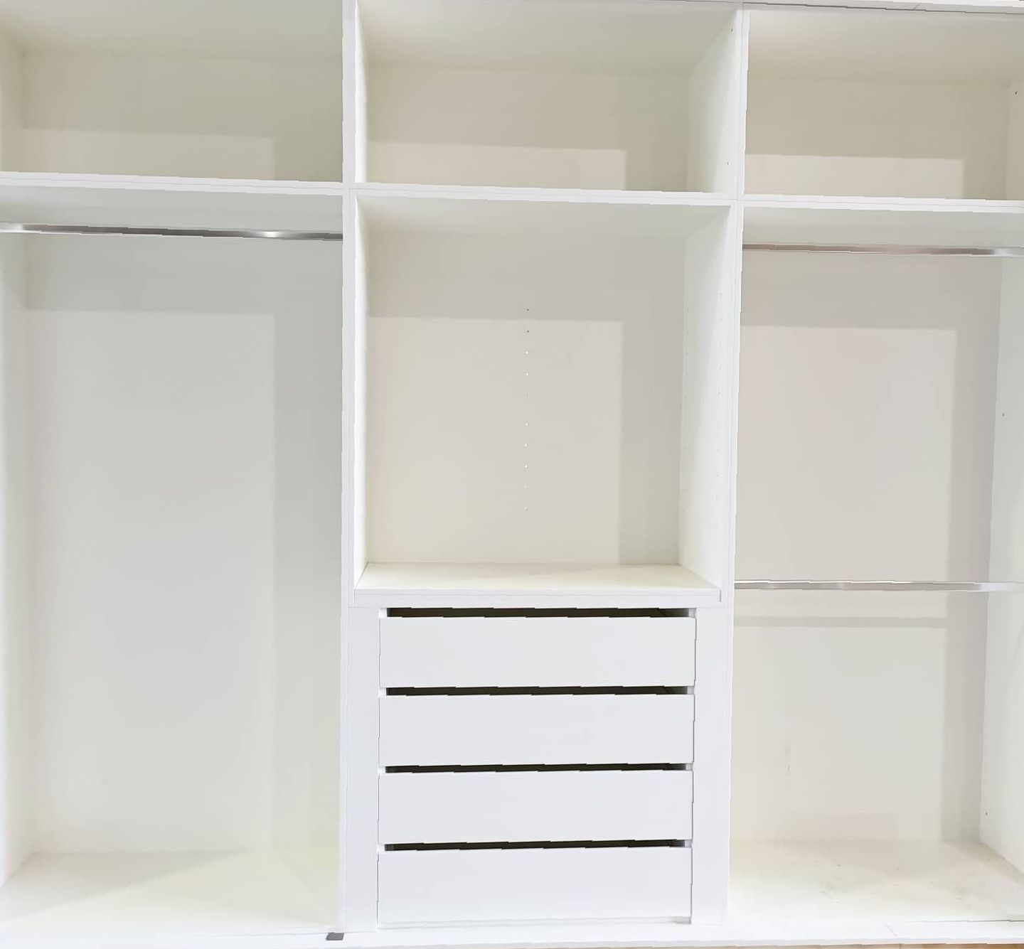 An empty white wardrobe — Custom Cabinets Design in Berrimah, NT