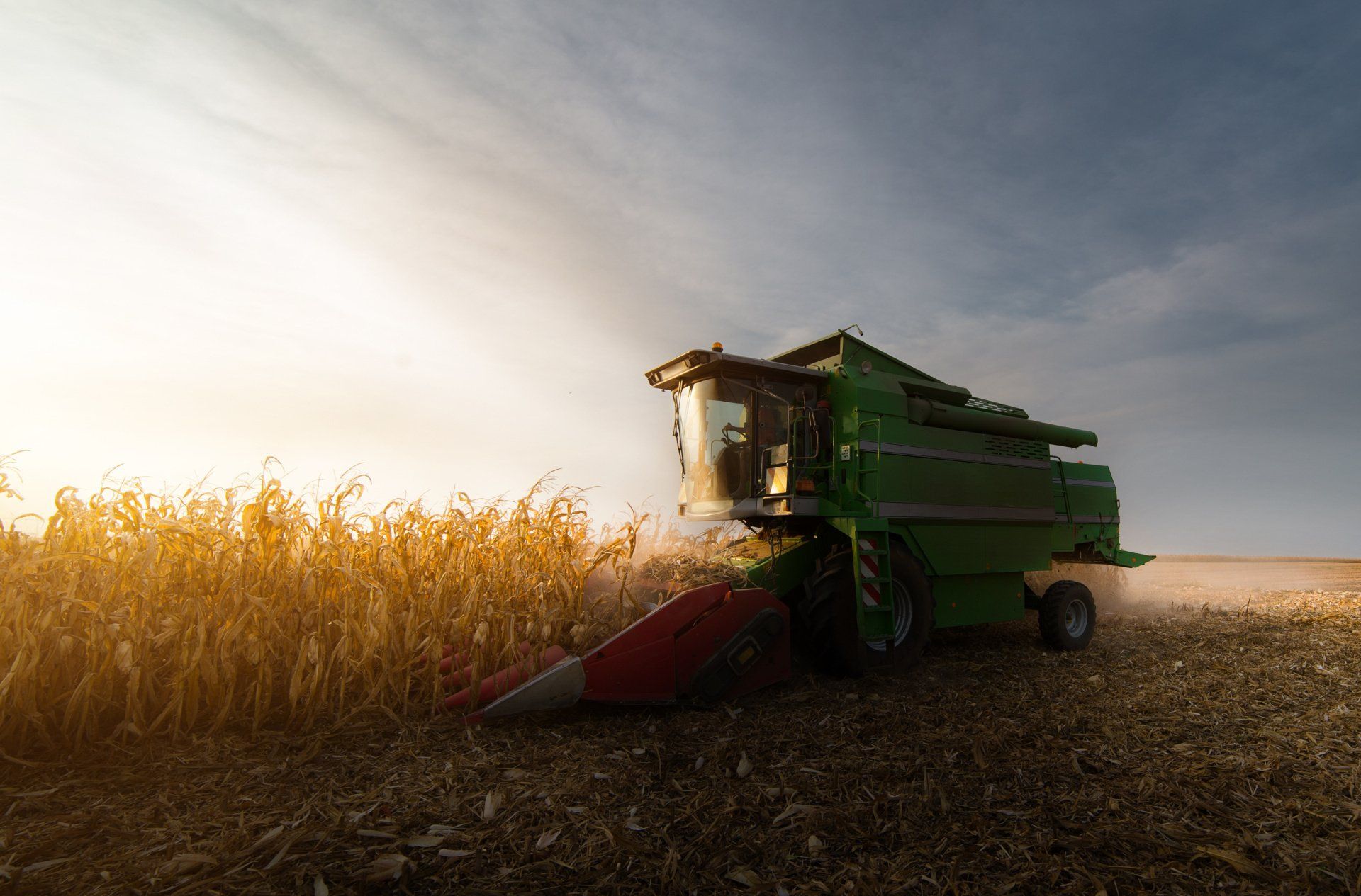 low emission internal combustion engine harvester
