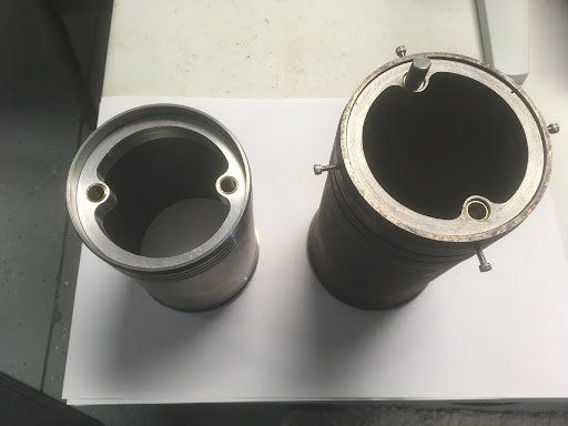 two wet sleeves with retaining collars