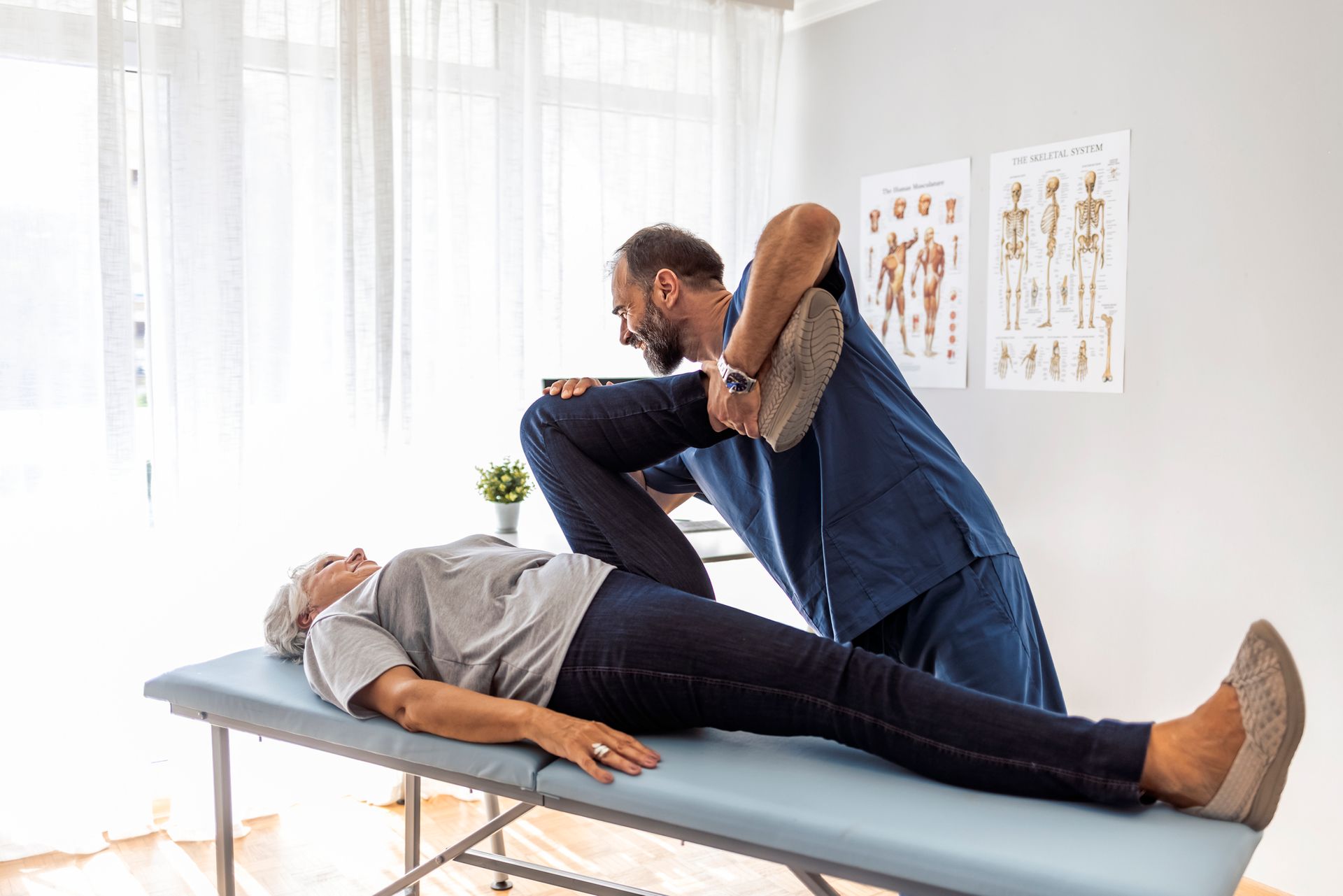 Stretching Patient's Leg — Little Falls, NJ — Health on Main