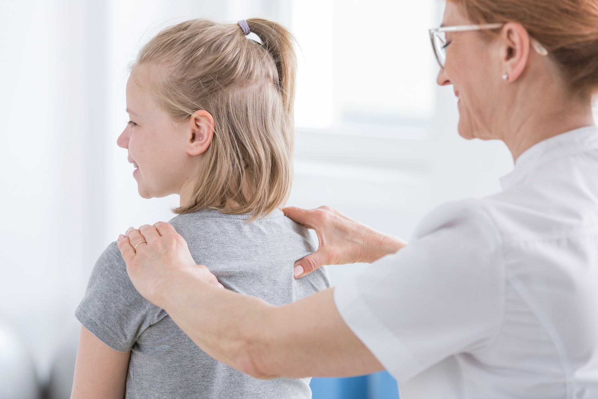 Checking Child's Back — Little Falls, NJ — Health on Main
