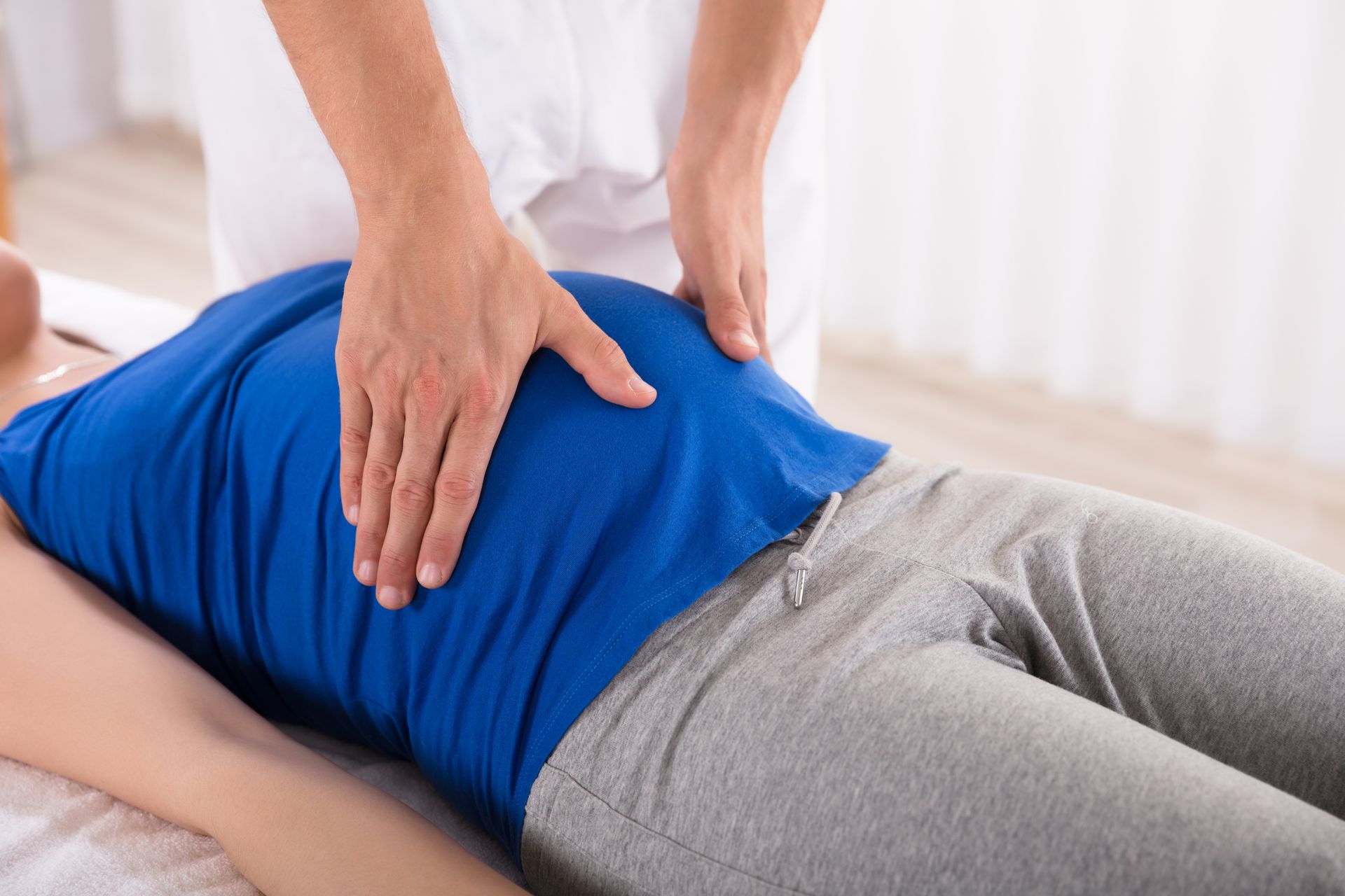 Checking Woman's Belly — Little Falls, NJ — Health on Main