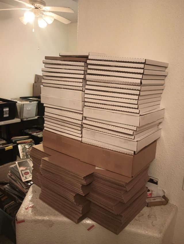A tall stack of LP shipping mailers used to send records to collectors