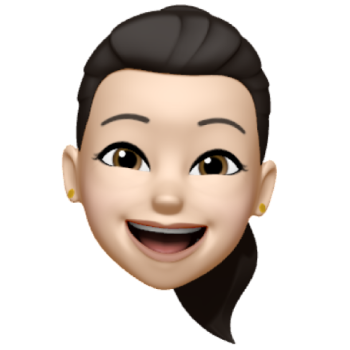 Smiling cartoon avatar with dark hair in a ponytail and gold earrings