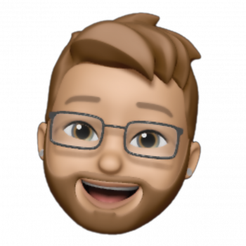 Smiling Memoji avatar with glasses and brown hair on a light background