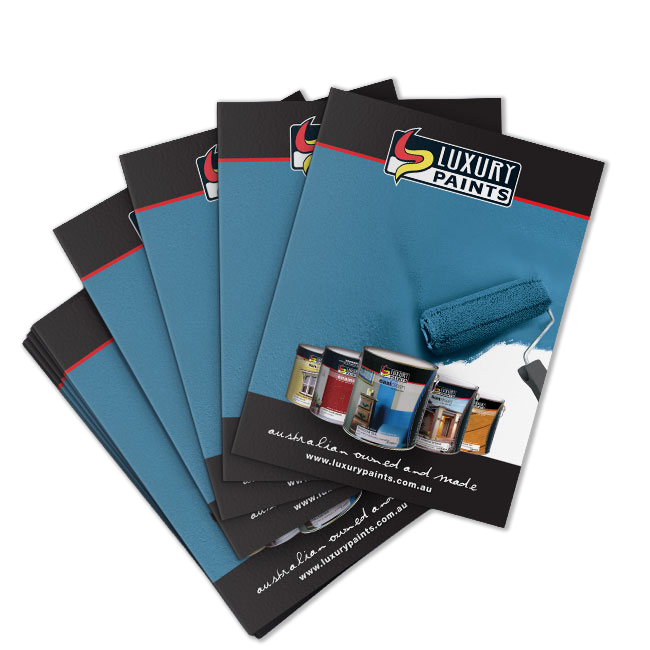 Stack of Luxury Paints brochures with blue covers and paint cans on the front.