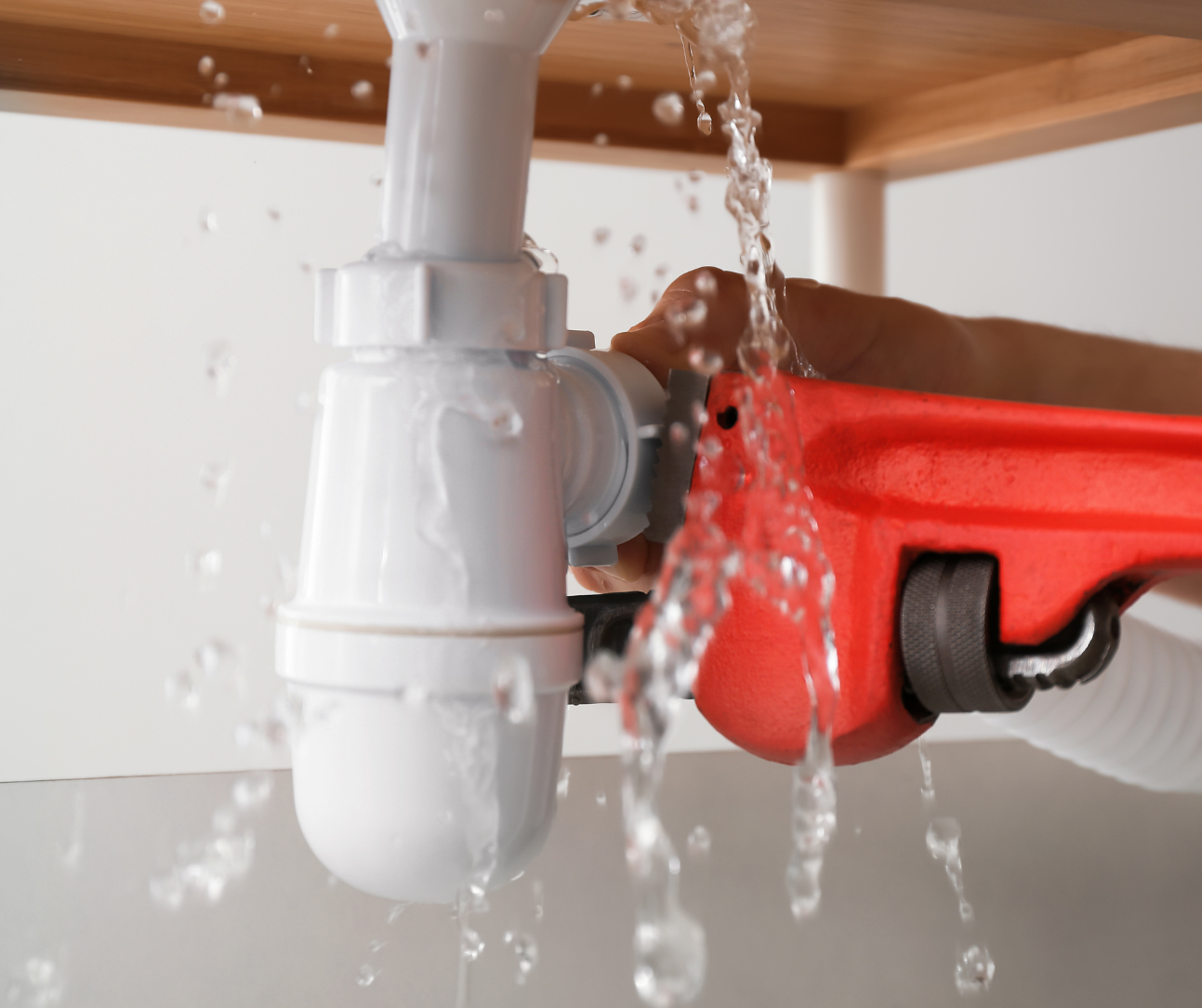 leaking white sink pipe