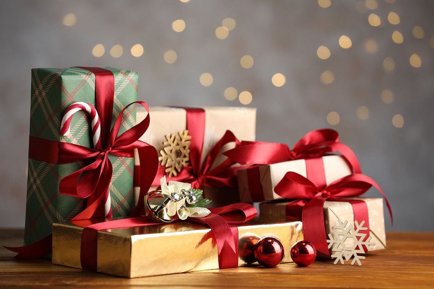 Wrapped gifts with red ribbon Wrapped gifts with red ribbon