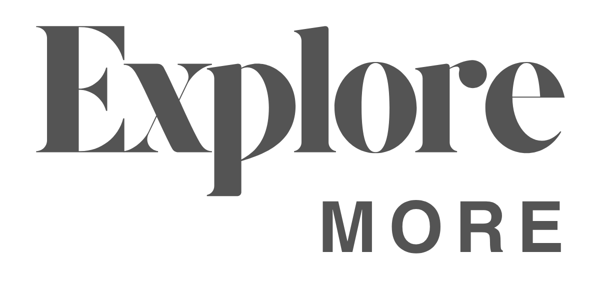 Real Estate logo in gray text on a white background