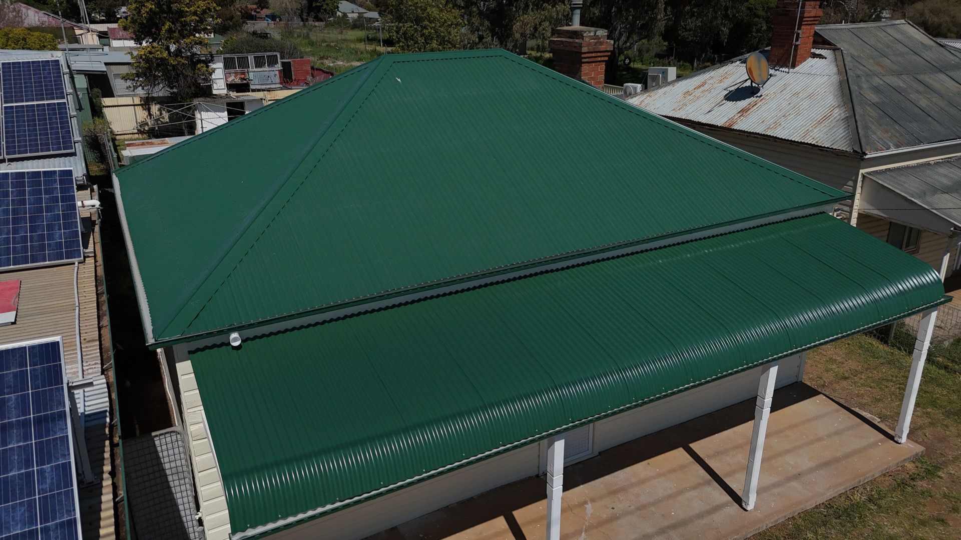 A Roof is Being Built With Red Tiles and a Gutter — JKD Pest & Carpentry In Wellington, NSW