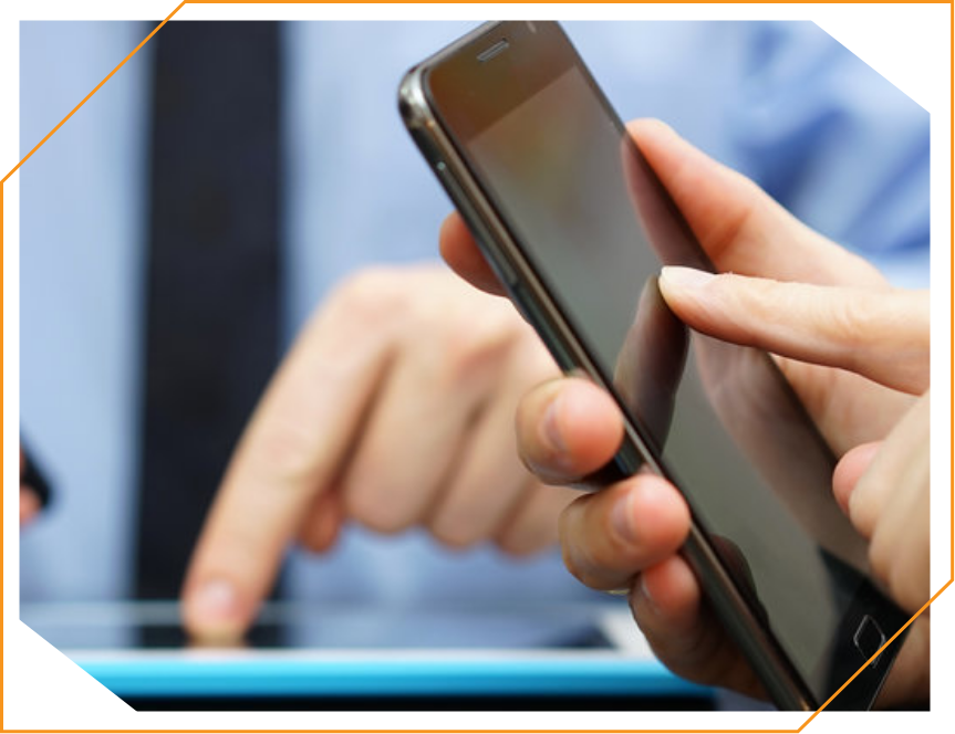 A close up of a person holding a cell phone