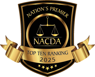 Gold and black award logo: NACDA Top Ten Ranking 2025. Shield with scales of justice and banner.
