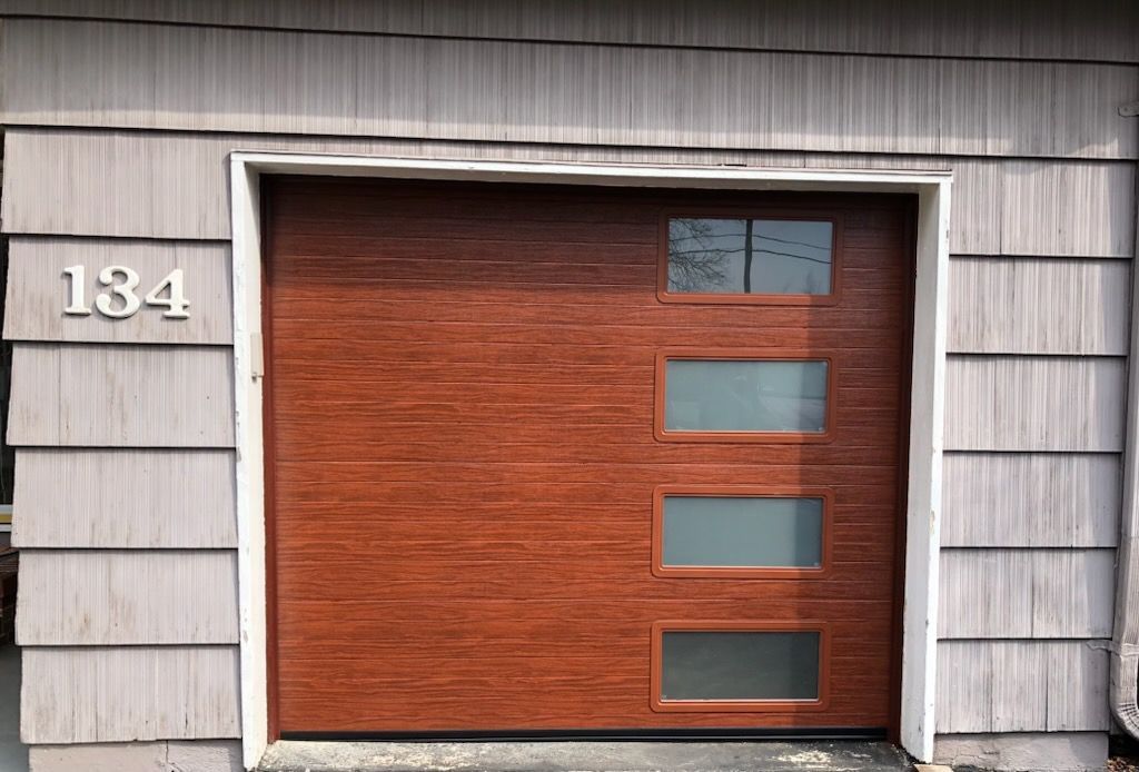 A garage door with the number 184 on it