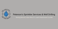 Logo for Peterson's Sprinkler Services & Well Drilling. Features a blue water droplet target and text.