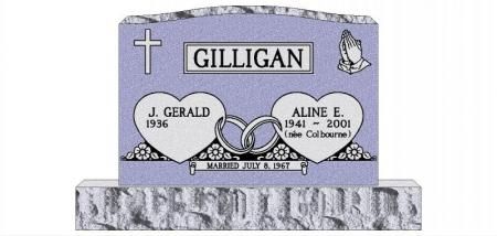 Gilligan family grave marker with engraved names, cross, roses, and a small decorative figure