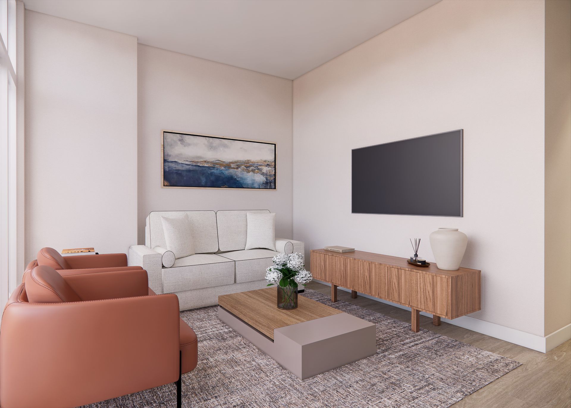 A modern living room with a white sofa, two coral armchairs, a wooden coffee table, and a wall-mounted television.