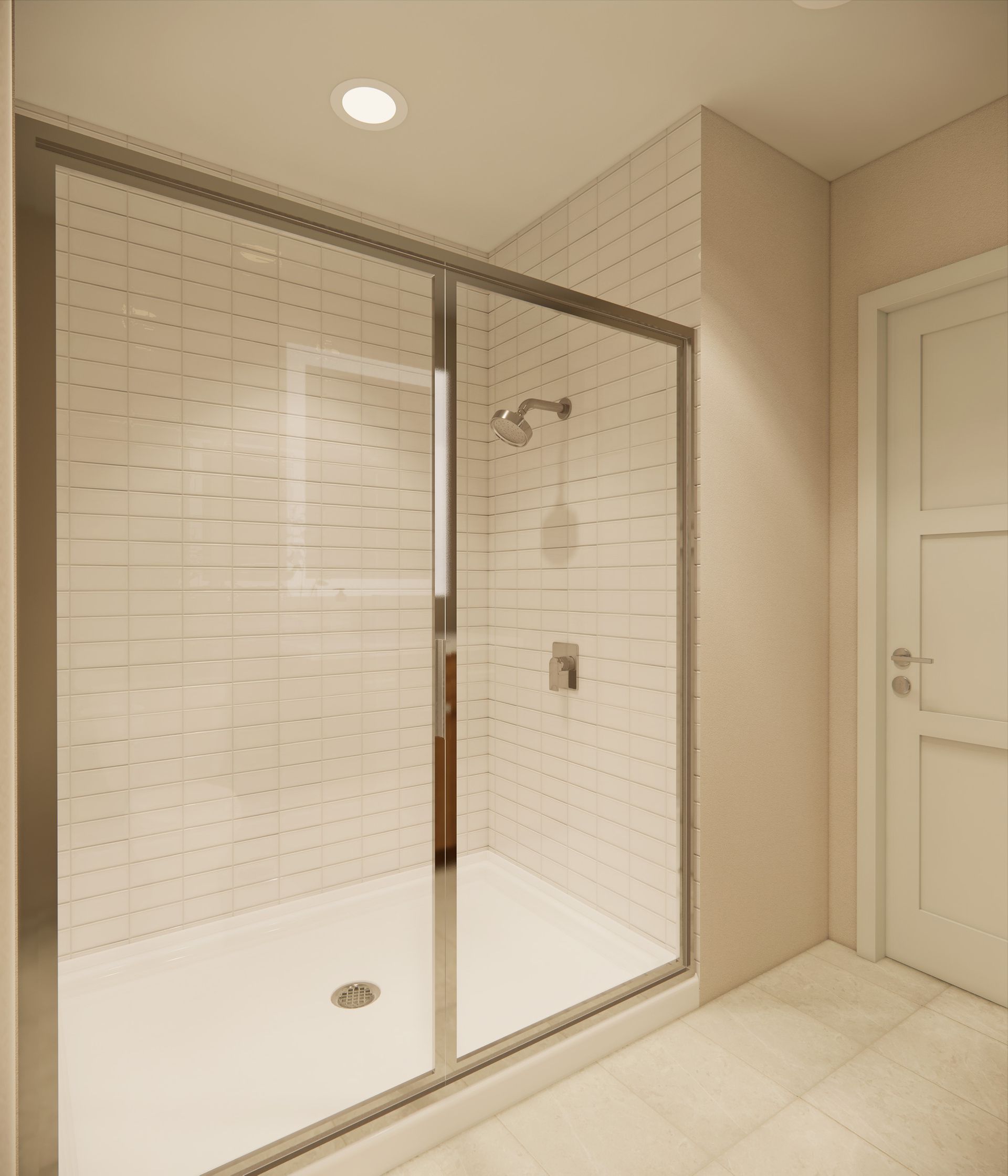 A modern walk-in shower with white tiled walls, a glass sliding door, and a white shower pan in a neutral bathroom.