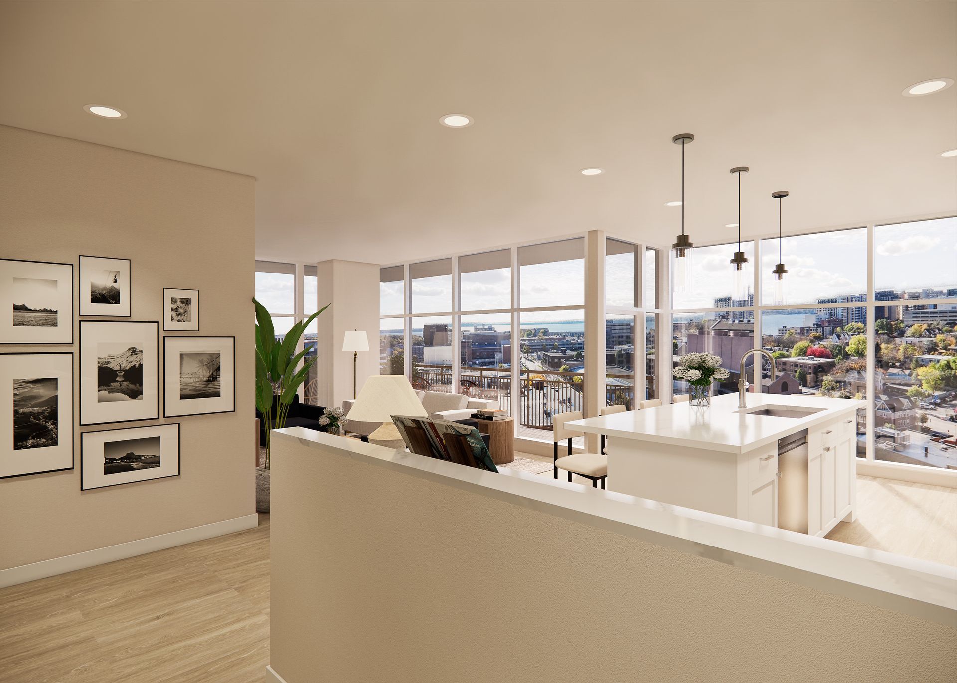 A modern open-concept apartment with a kitchen island, neutral decor, wall art, and large windows overlooking a city view.