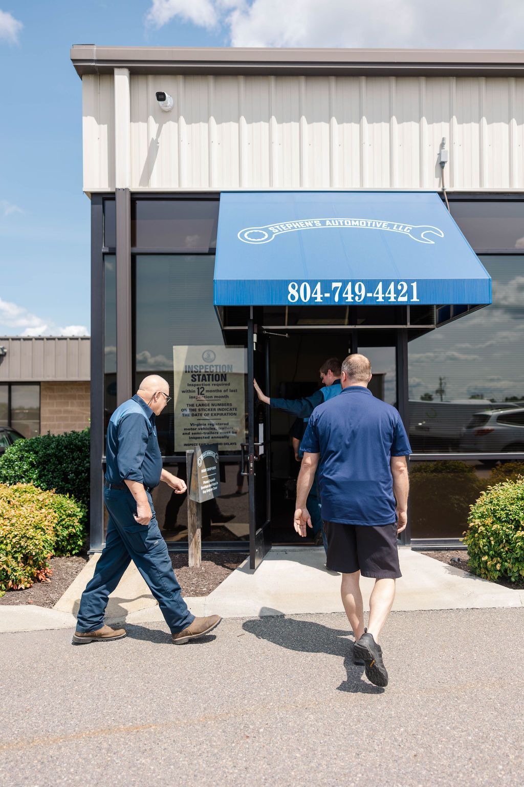 Stephen's Automotive team in front of their auto shop | Stephen's Automotive
