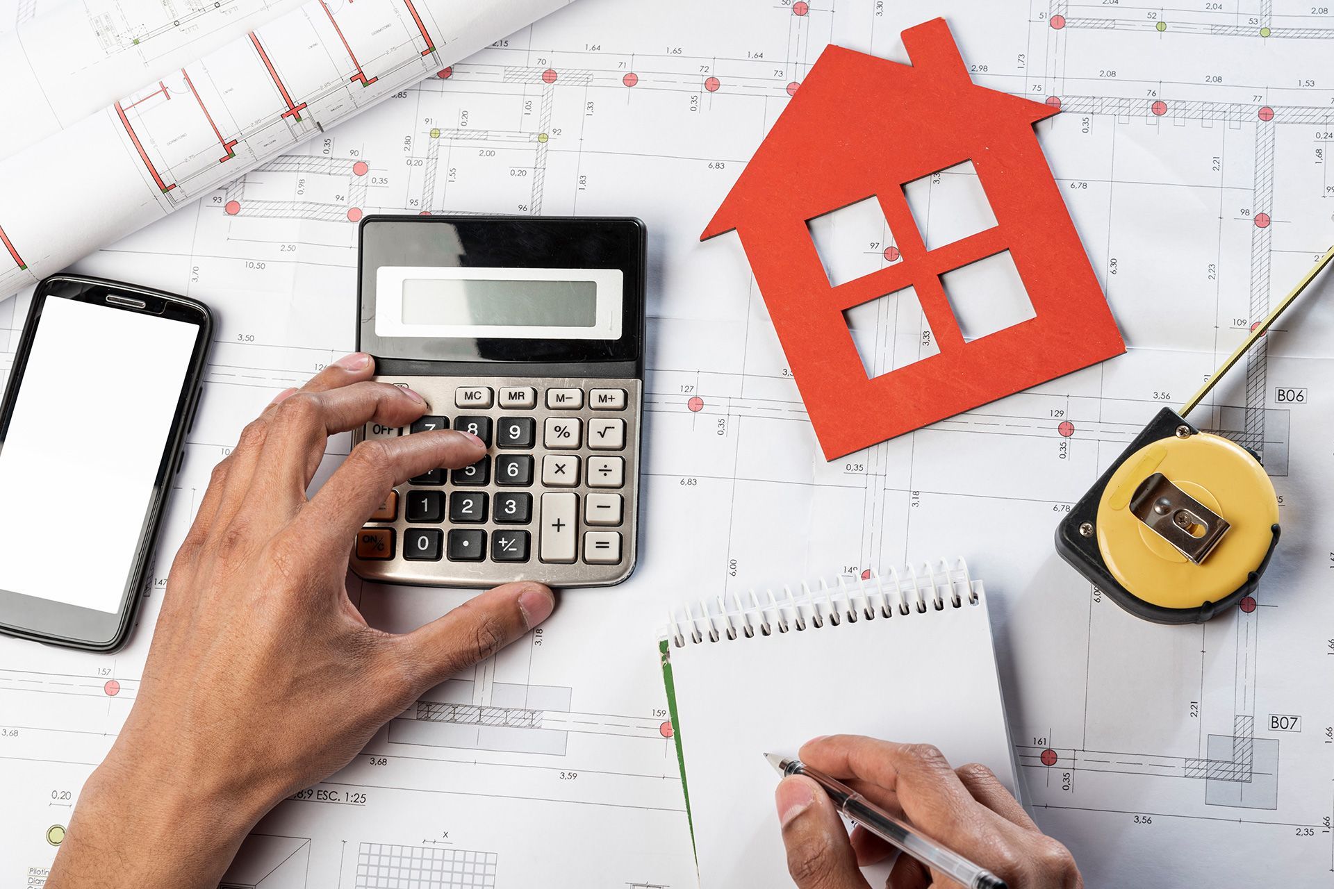 Michigan home inspector reviewing property details with a buyer before a home inspection