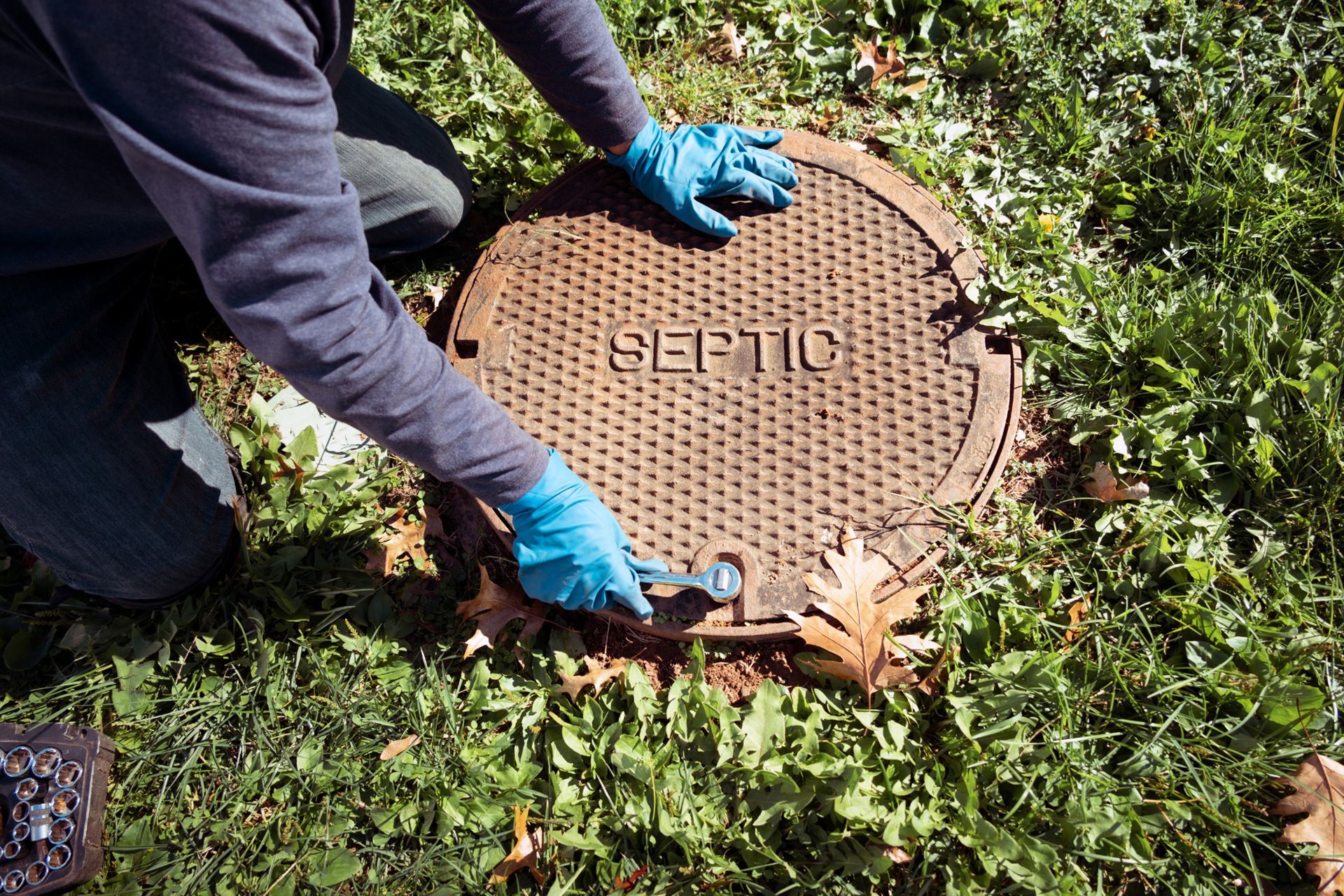 Inspector testing wastewater flow