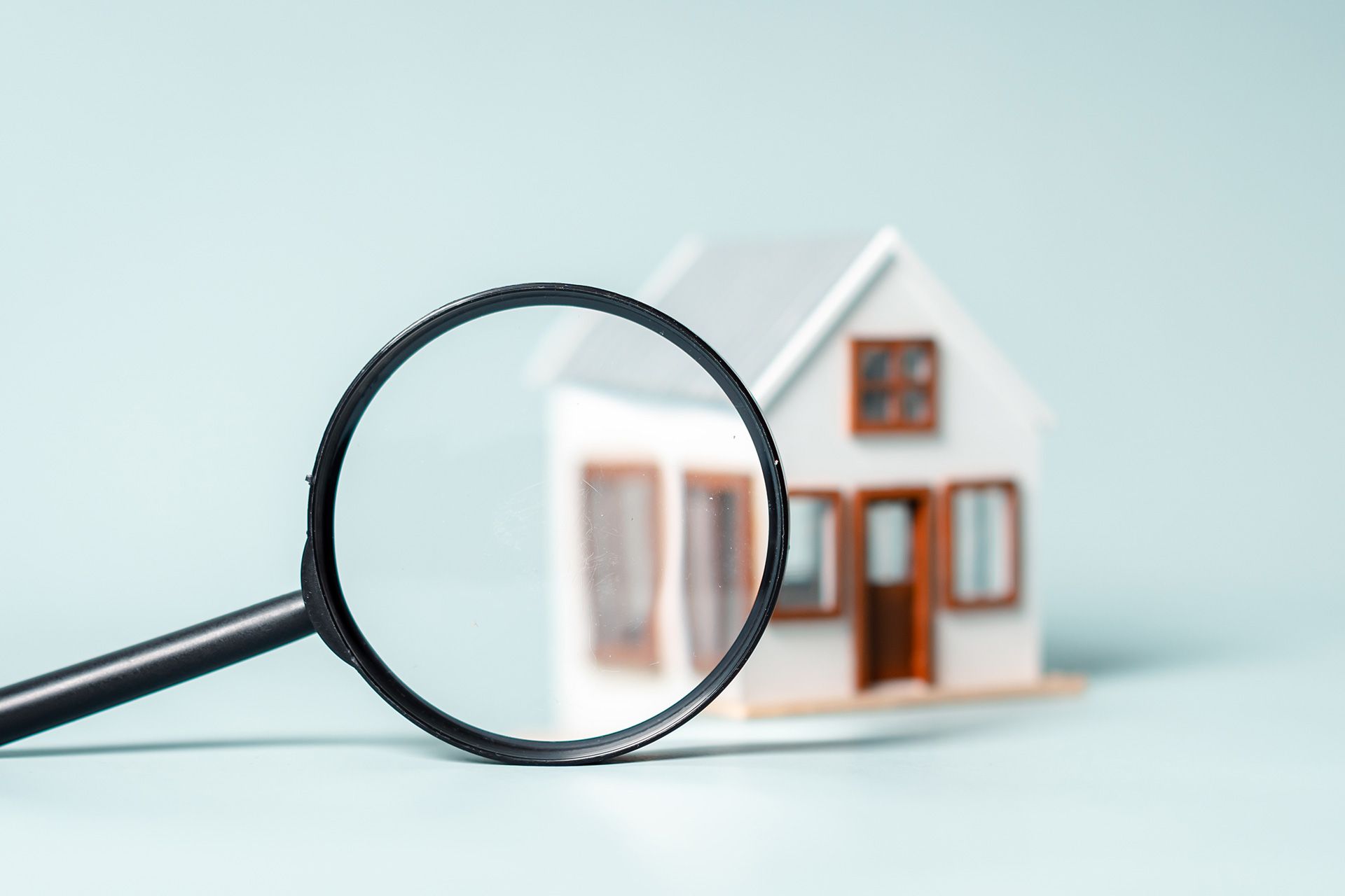 Home inspector checking house foundation during inspection
