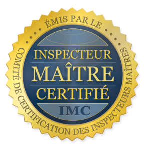 Gold and blue certification seal reading “Inspecteur Maître Certifié IMC” with French text around the edge