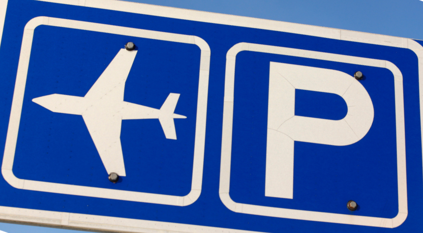 Blue sign with an airplane and the letter