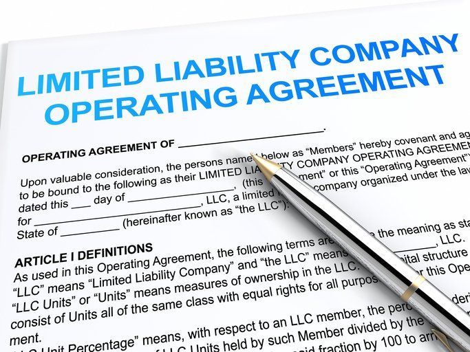 A close up of a limited liability company operating agreement