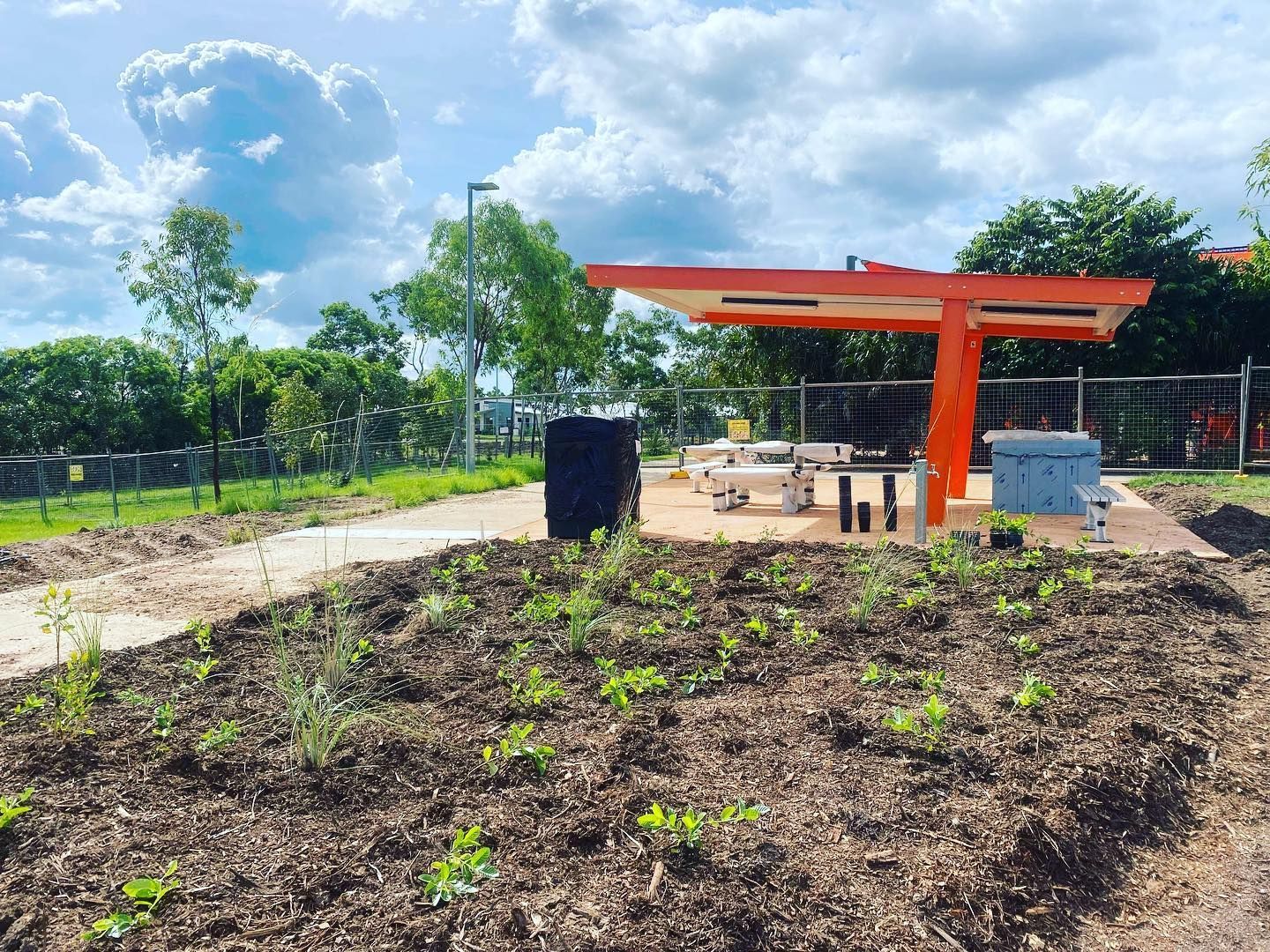 Serene Seaside with Concrete Pathway — Rural & Commercial Landscaper in Humpty Doo, NT