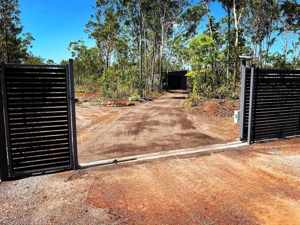 Gate and Fence Along a Pathway — Rural & Commercial Landscaper in Palmerston, NT