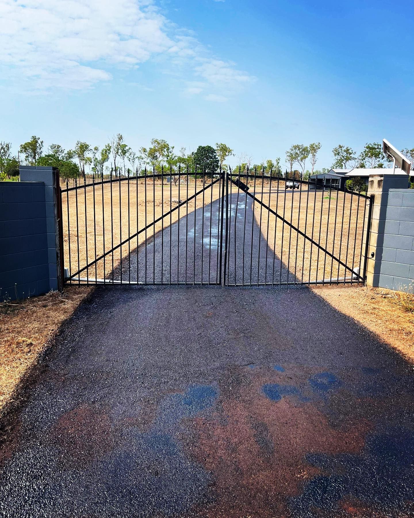 Newly Laid Concrete Driveway In Rural Property  — Rural & Commercial Landscaper in Palmerston, NT