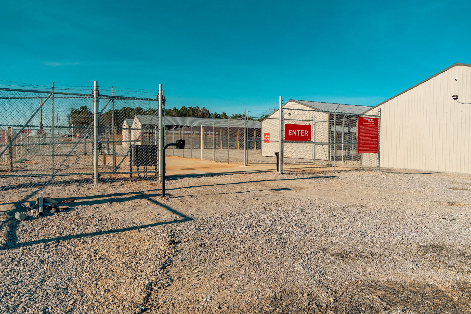 Entry to RV Storage and Boat Storage Washing Facility with Dumpster Access and Sewage Pumping or Sewage Handling