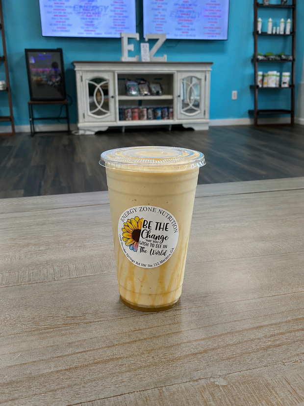 Meal replacement protein shakes with creamy textures and healthy toppings in a bright nutrition shop.