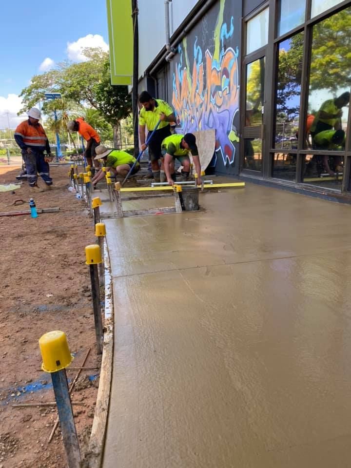 Civil Workers Applying Concrete — JLM Contracting Services Pty Ltd in Palmerston, NT
