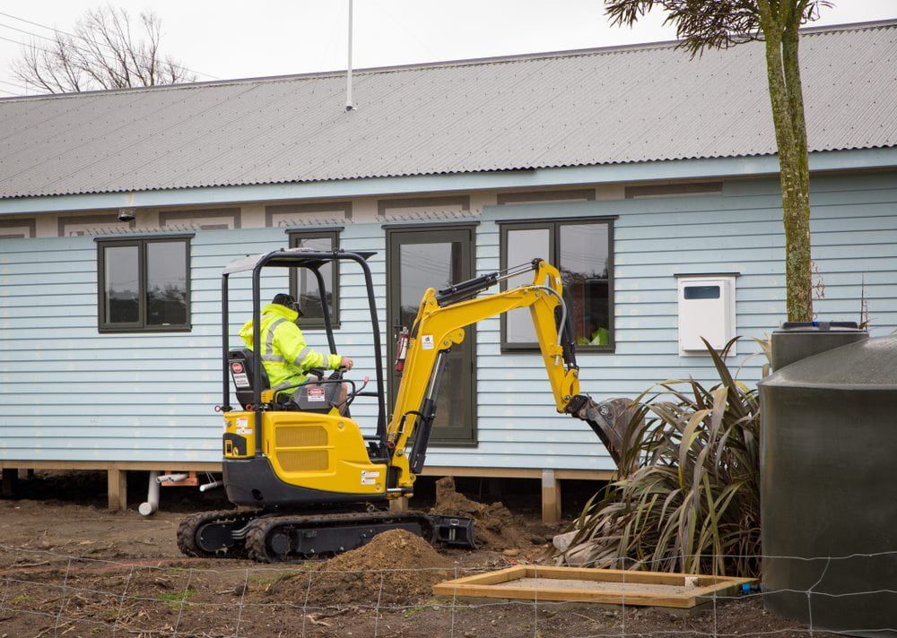Yellow Mini Excavator — JLM Contracting Services Pty Ltd in Virginia, NT