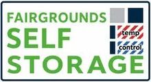 Fairgrounds Self Storage sign with green text and temp control logo