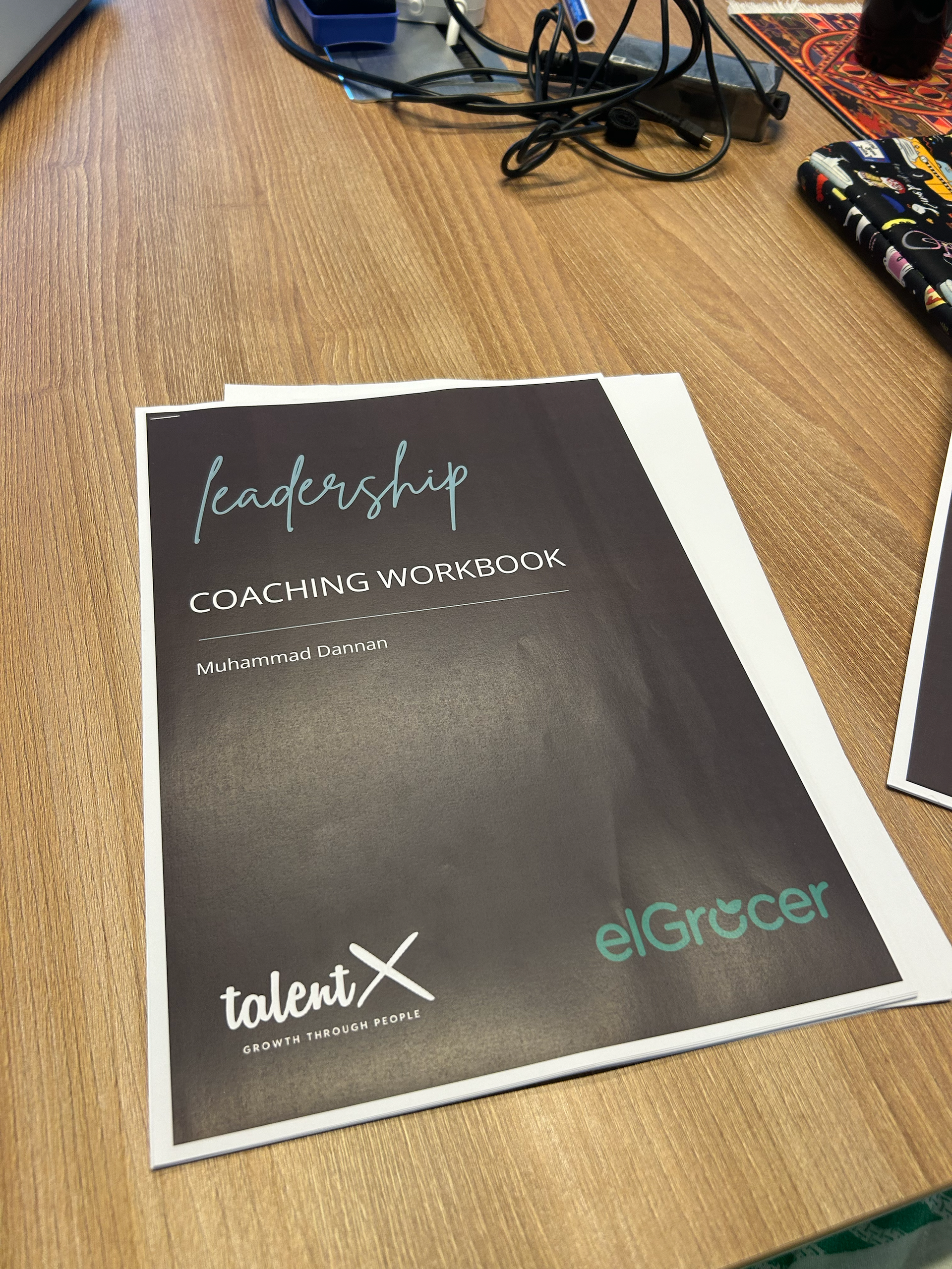 Leadership coaching workbook and executive coaching session setup for managers and leaders