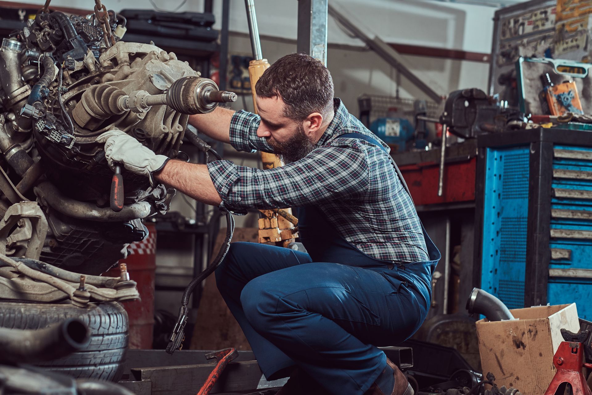 Mechanic specialist repairs the car engine. Mechanic specialist repairs the car engine.