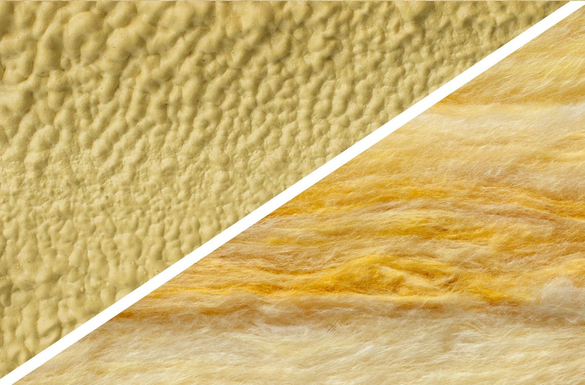Close-up of two textured yellow insulation surfaces split diagonally by a white line