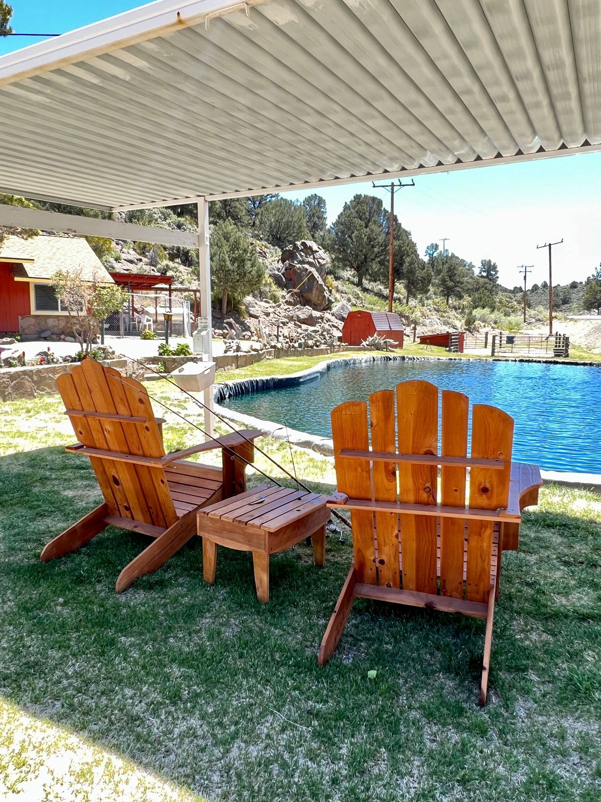 resort-pond-and-Adirondack-chairs