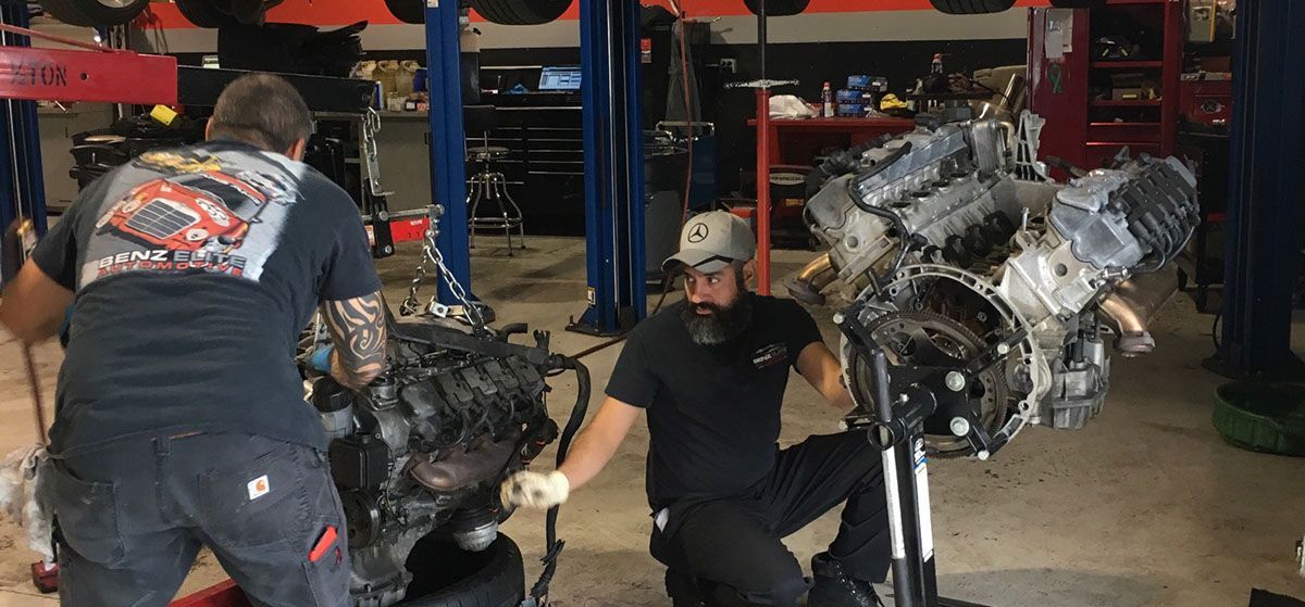 mechanic repairing a vehicle | Benz Elite Automotive