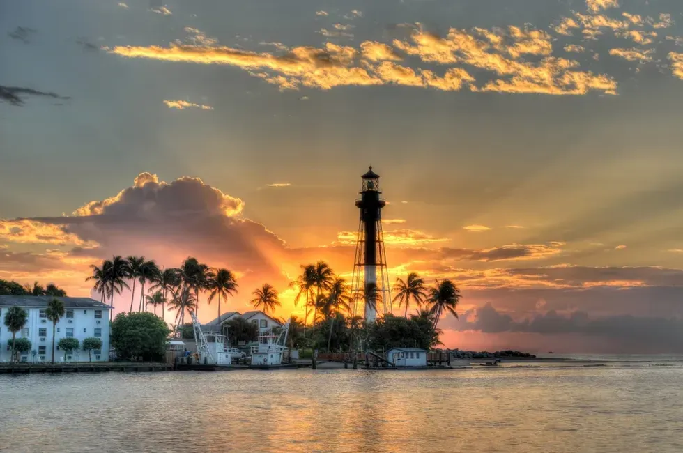 Sunset over Hillsboro Inlet lighthouse in Hillsboro Beach