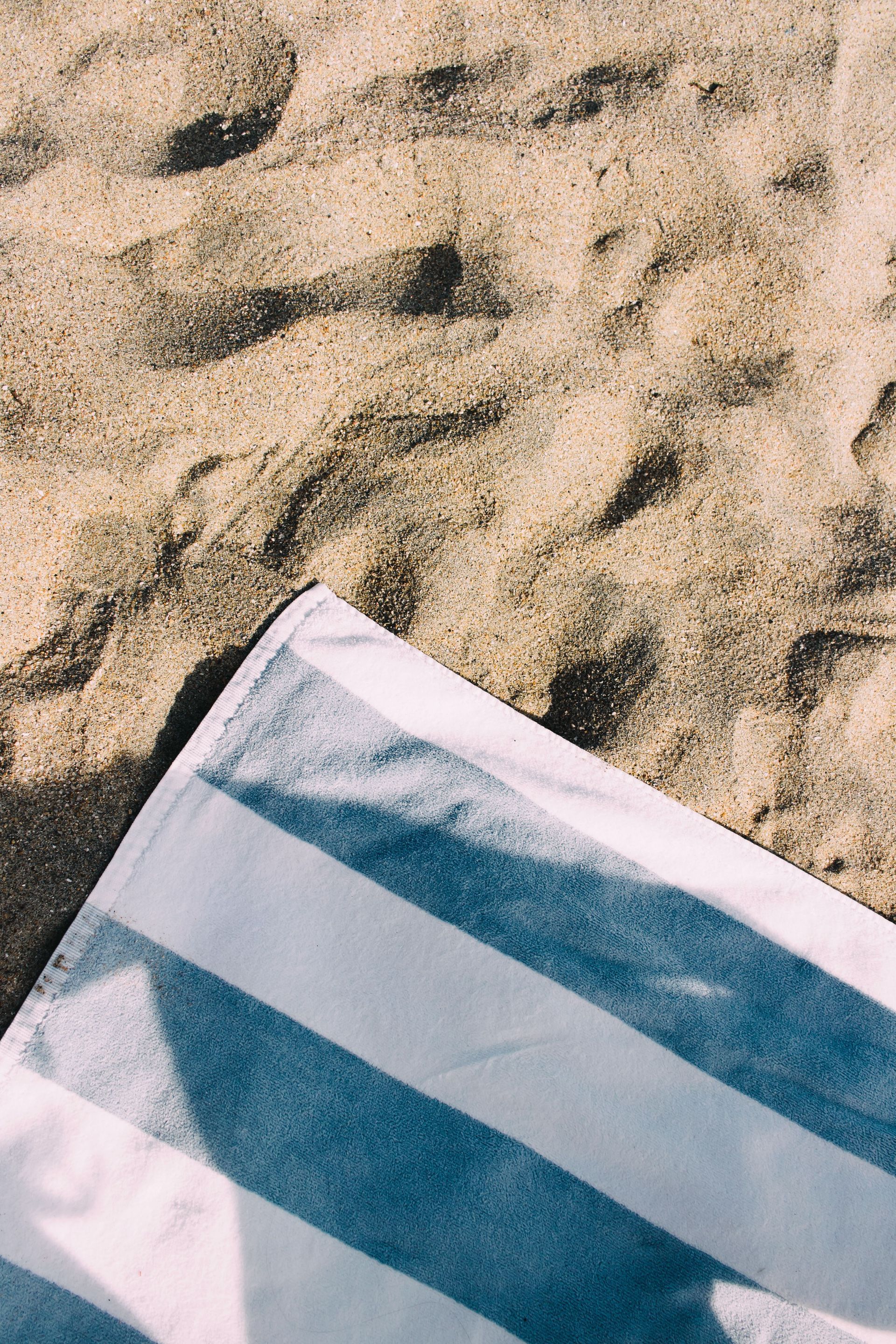 Beach towels, swimsuits, and laundry baskets for summer laundry in Pompano Beach