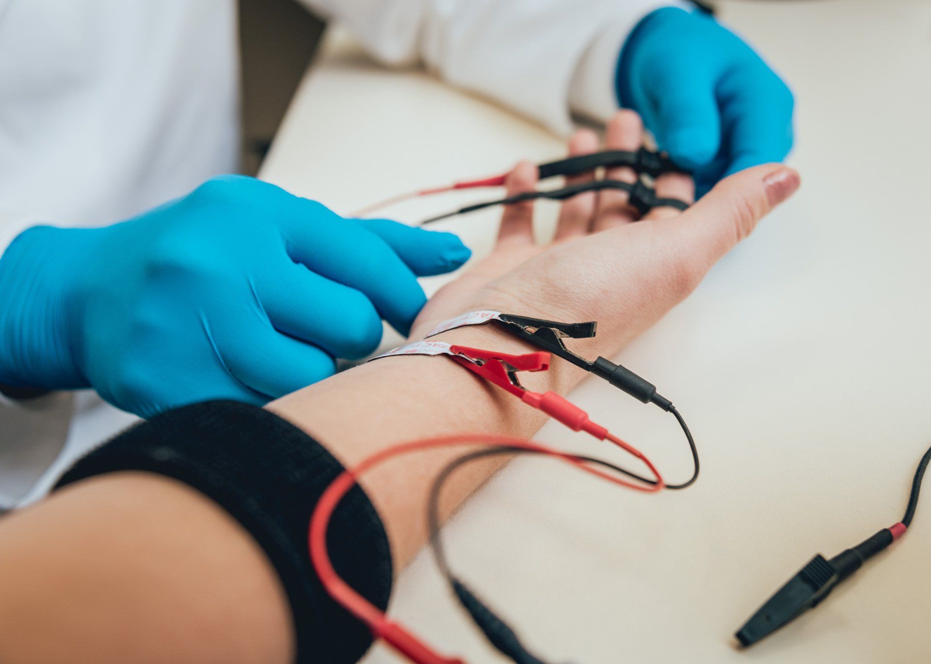 Patient nerves testing using electromyography. Medical examination. EMG