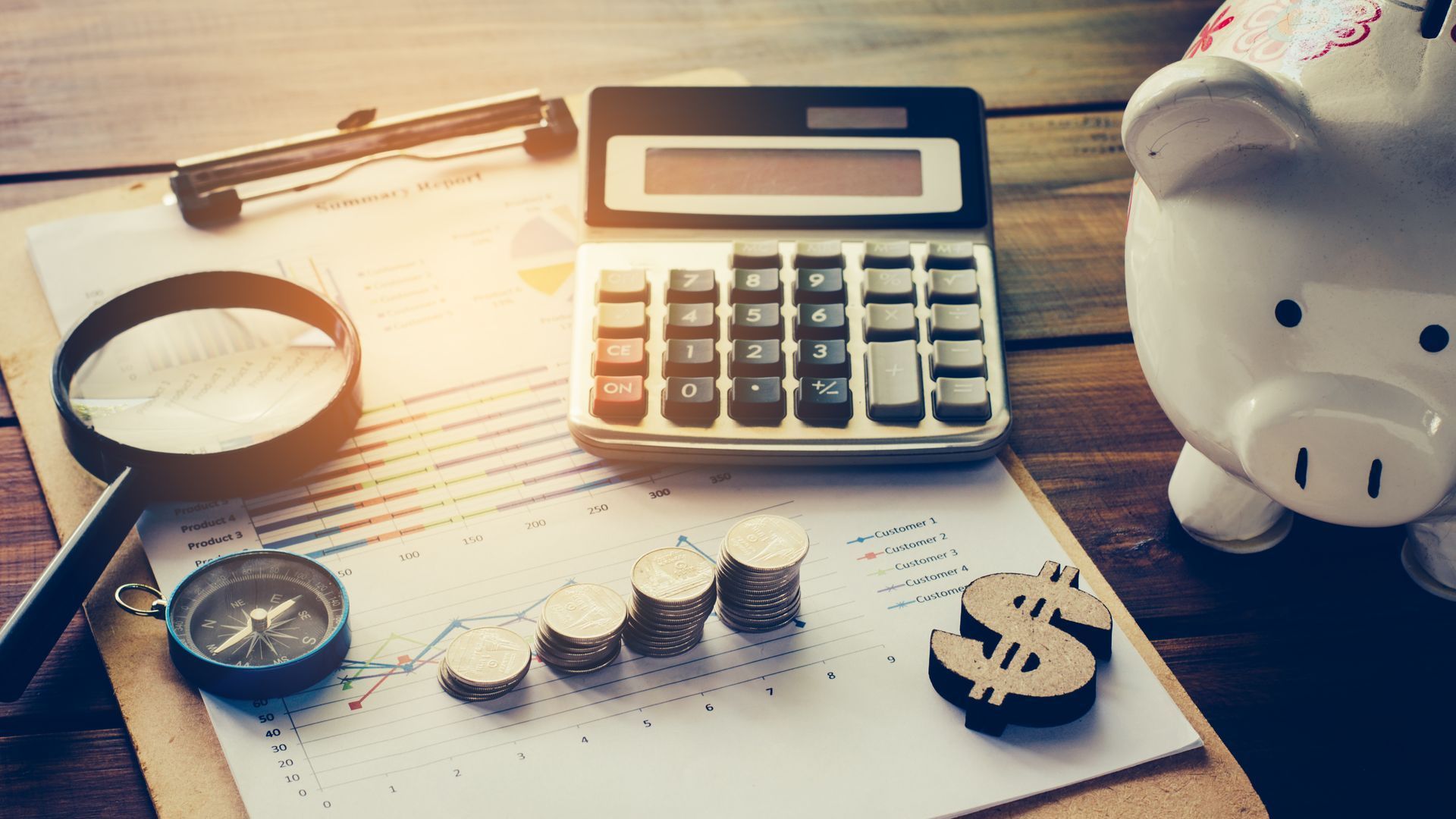 image of calculator, coins and spreadsheets